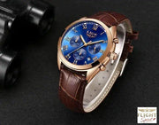 Fliegeruhr mit Lederarmband und goldfarbenem Zifferblatt
